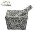 Almofariz e pilão de granito de forma quadrada